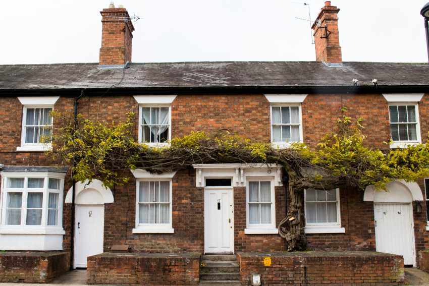 row of houses with white doors